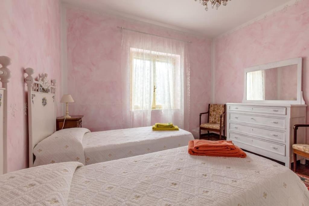 Le Bouganville Apartment เดเซนซาโนเดลการ์ดา ภายนอก รูปภาพ